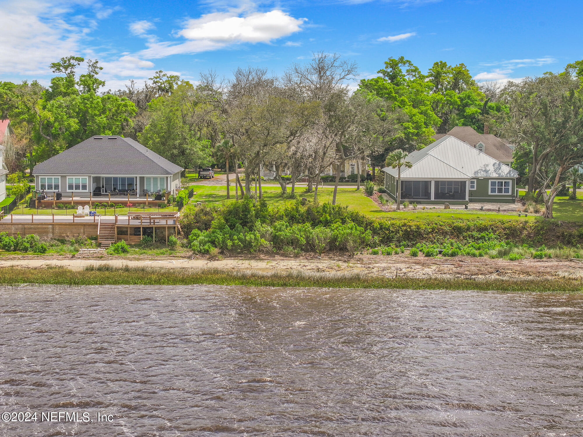 28676 Grandview Manor Yulee, FL 32097 - Photo 15 of 23 a front view of a house with a yard and garage