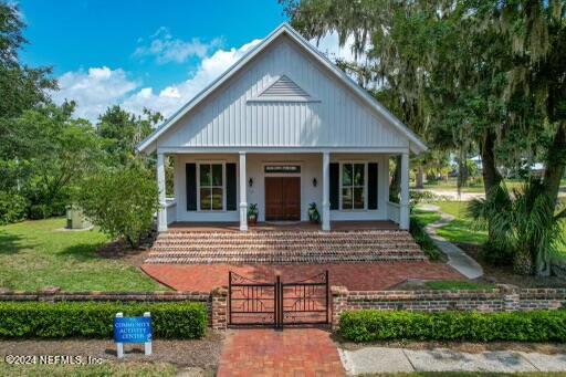 28676 Grandview Manor Yulee, FL 32097 - Photo 23 of 23 a view of front of house with a yard