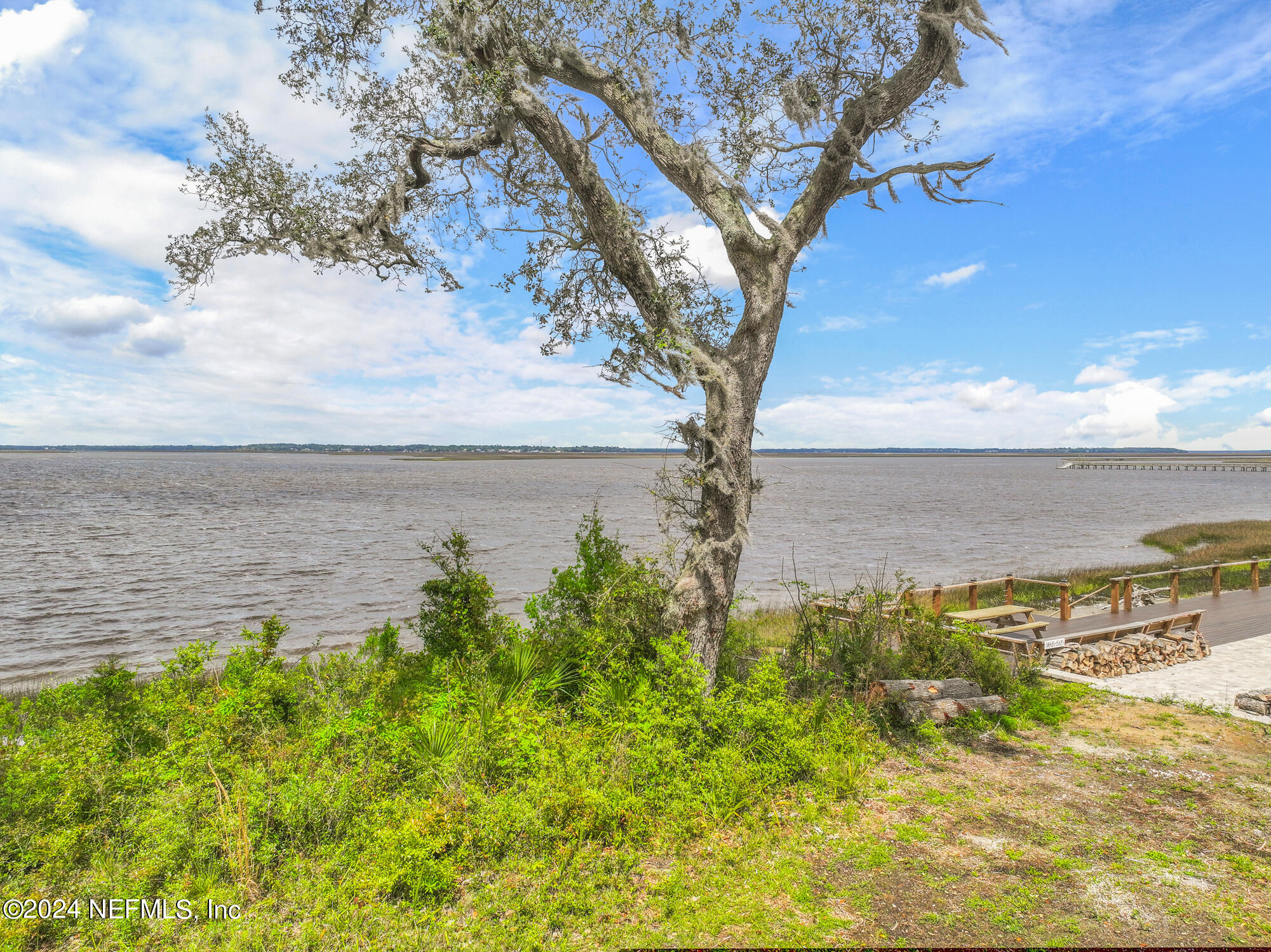28676 Grandview Manor Yulee, FL 32097 - Photo 8 of 23 a view of a lake with a yard