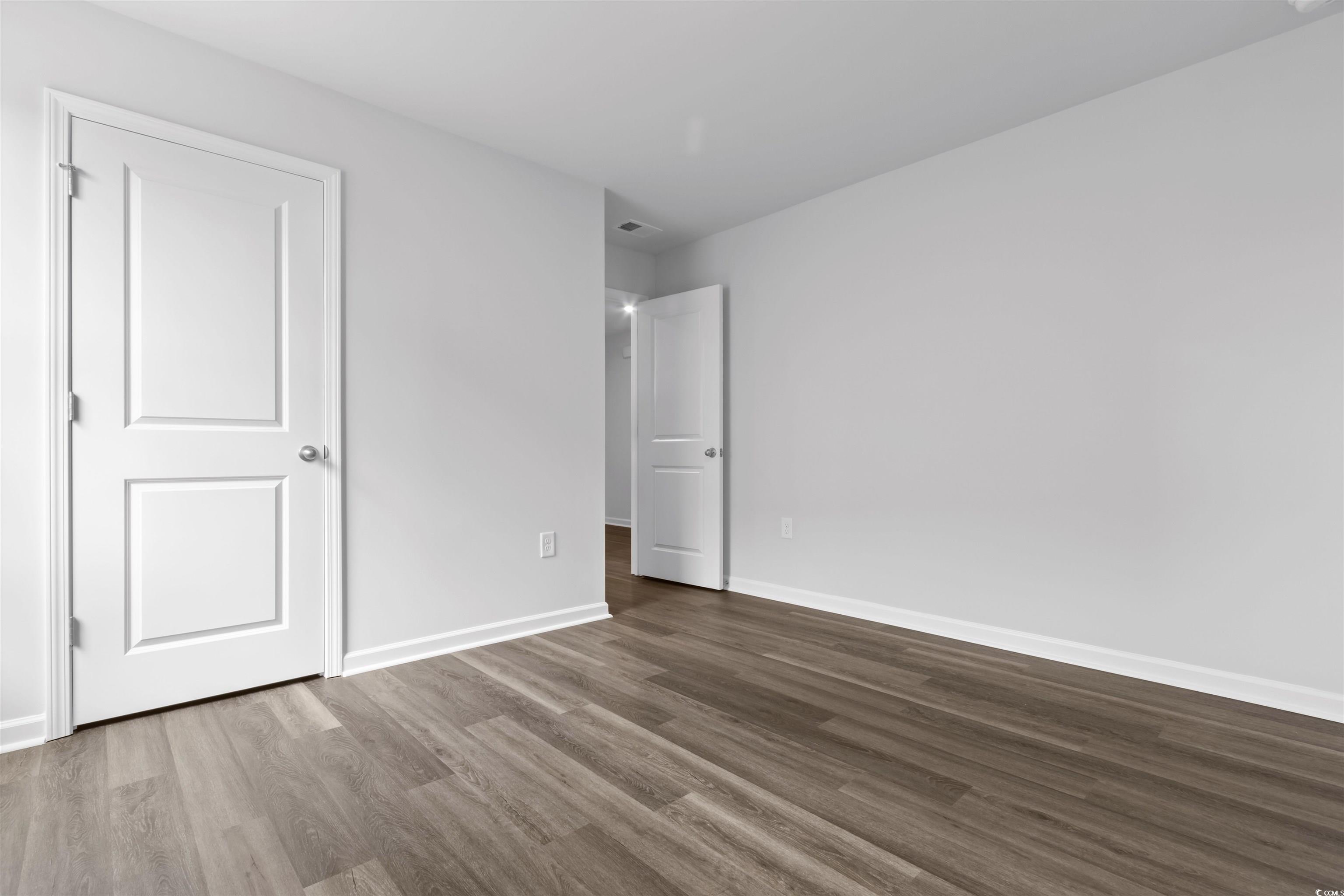 72 Cpe Pt Drive Conway, SC 29527 - Photo 14 of 34 Unfurnished bedroom featuring hardwood / wood-styl