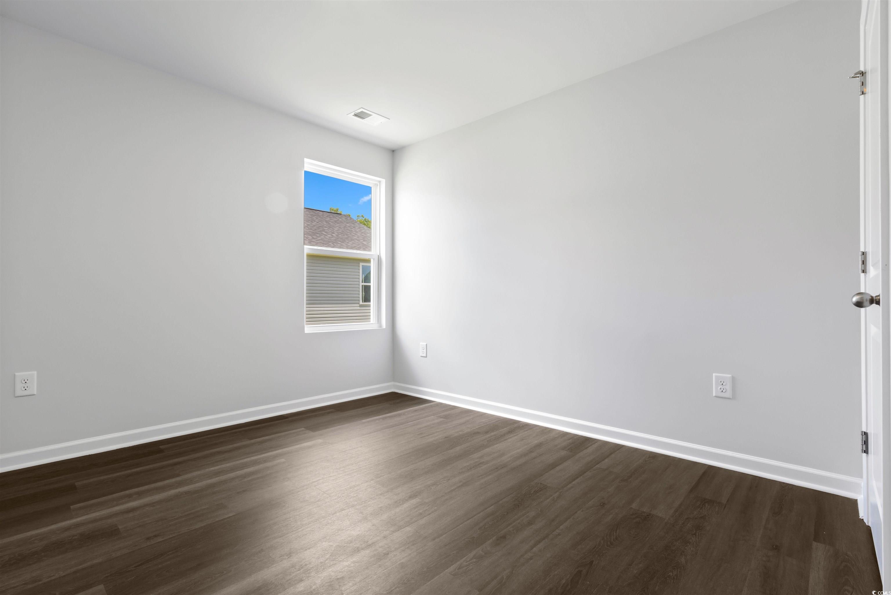 72 Cpe Pt Drive Conway, SC 29527 - Photo 15 of 34 Spare room with dark hardwood / wood-style floorin