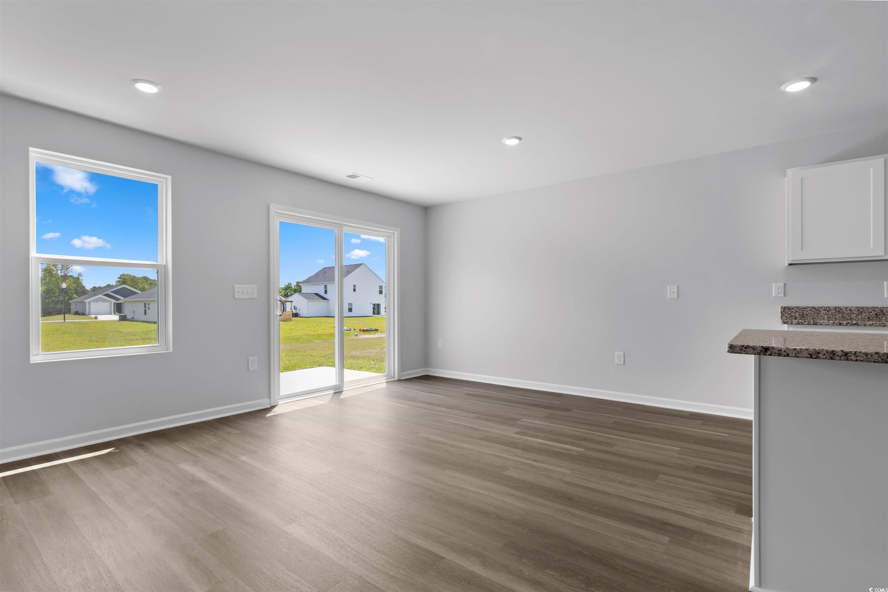 72 Cpe Pt Drive Conway, SC 29527 - Photo 25 of 34 Unfurnished living room with a wealth of natural l