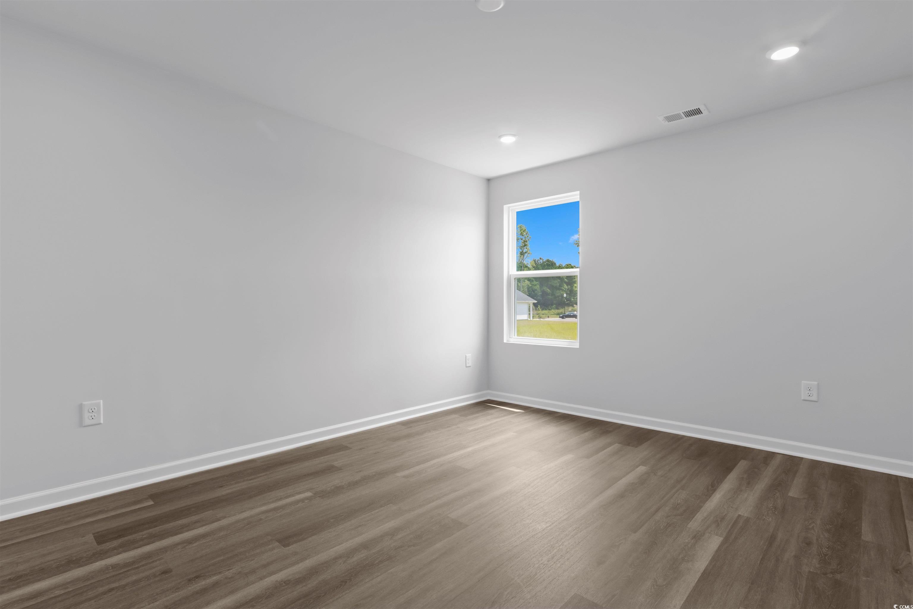 72 Cpe Pt Drive Conway, SC 29527 - Photo 28 of 34 Empty room with dark wood-type flooring