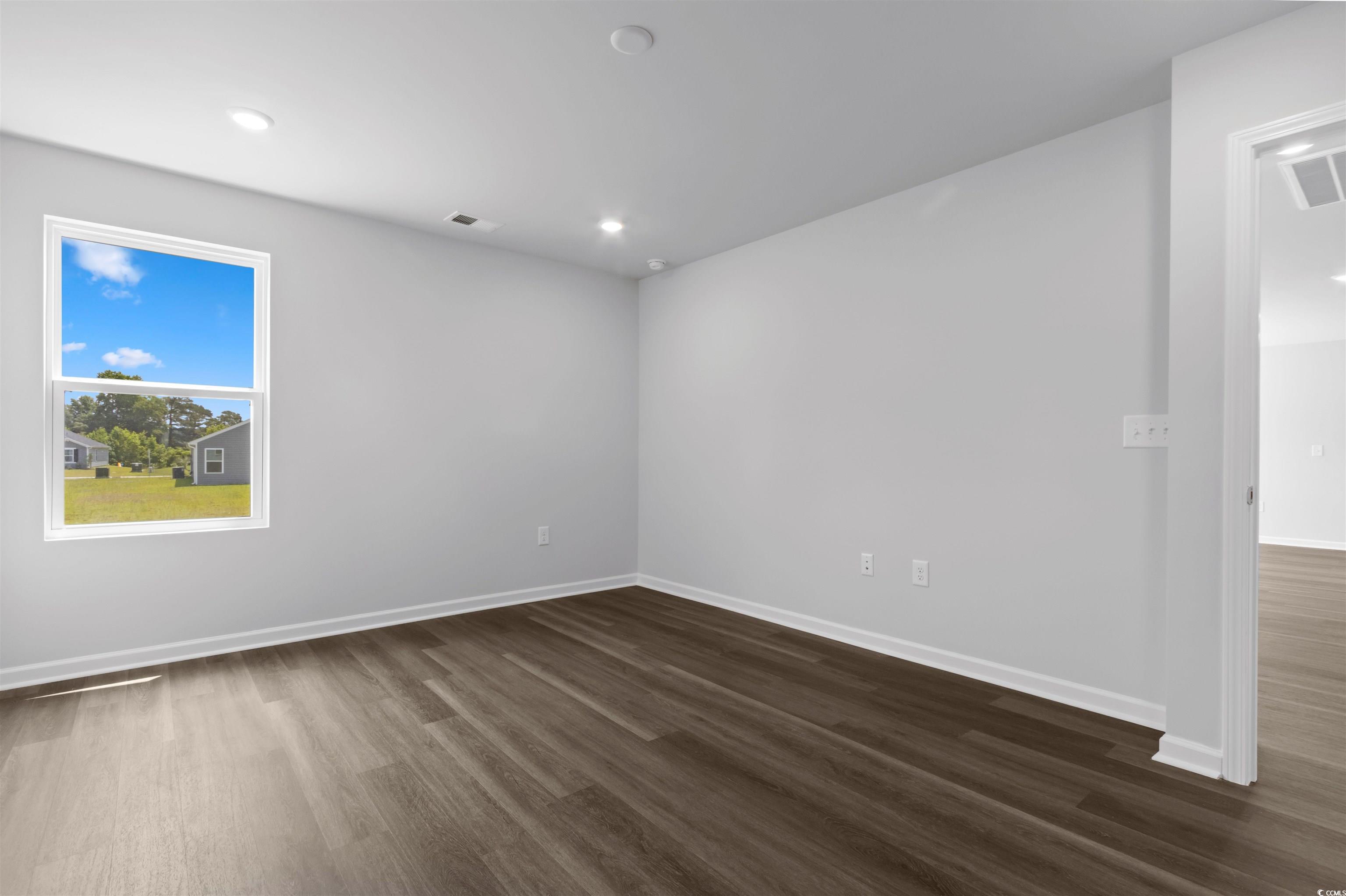 72 Cpe Pt Drive Conway, SC 29527 - Photo 29 of 34 Empty room with dark hardwood / wood-style floors