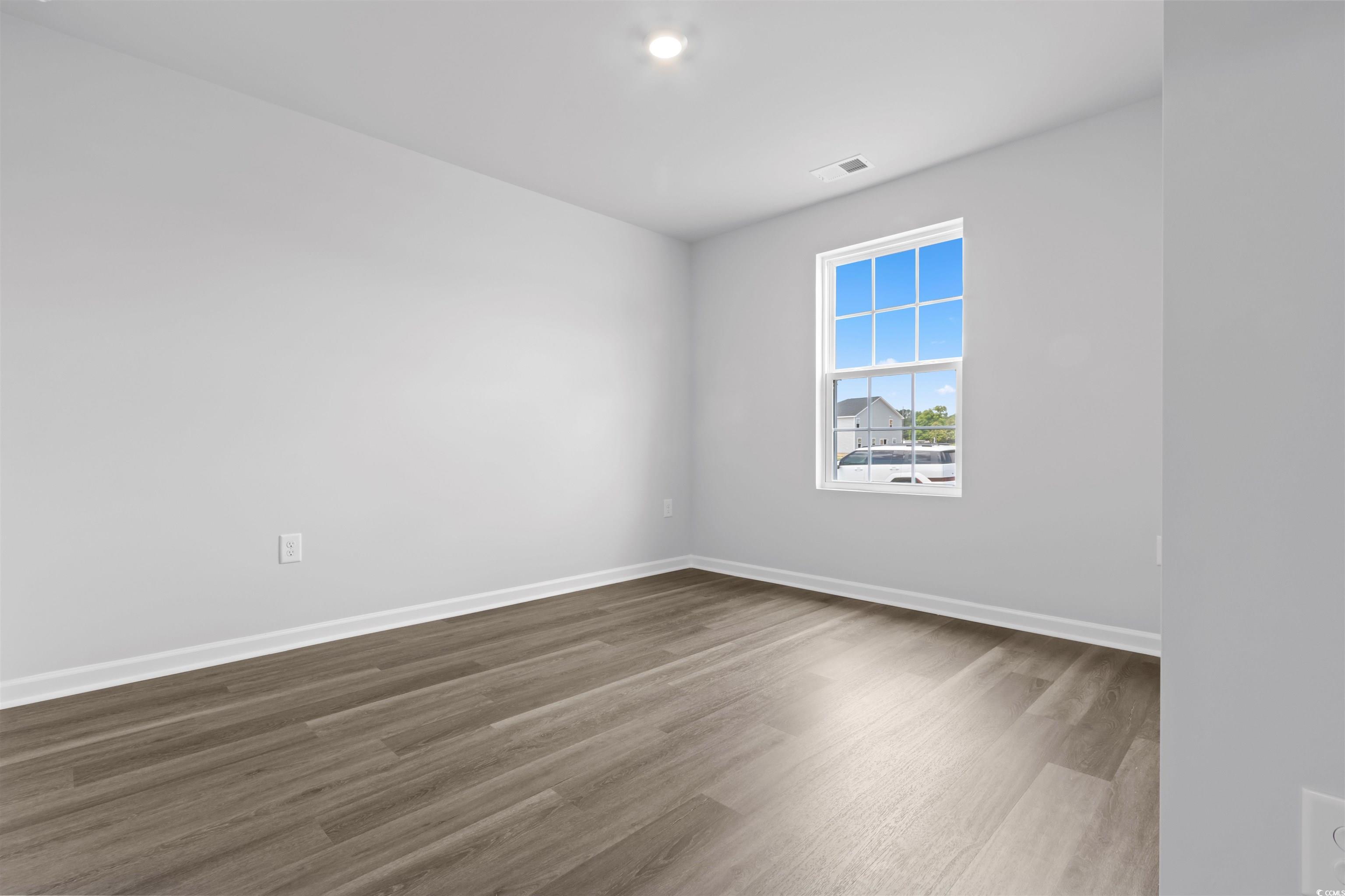 72 Cpe Pt Drive Conway, SC 29527 - Photo 9 of 34 Unfurnished room featuring dark hardwood / wood-st