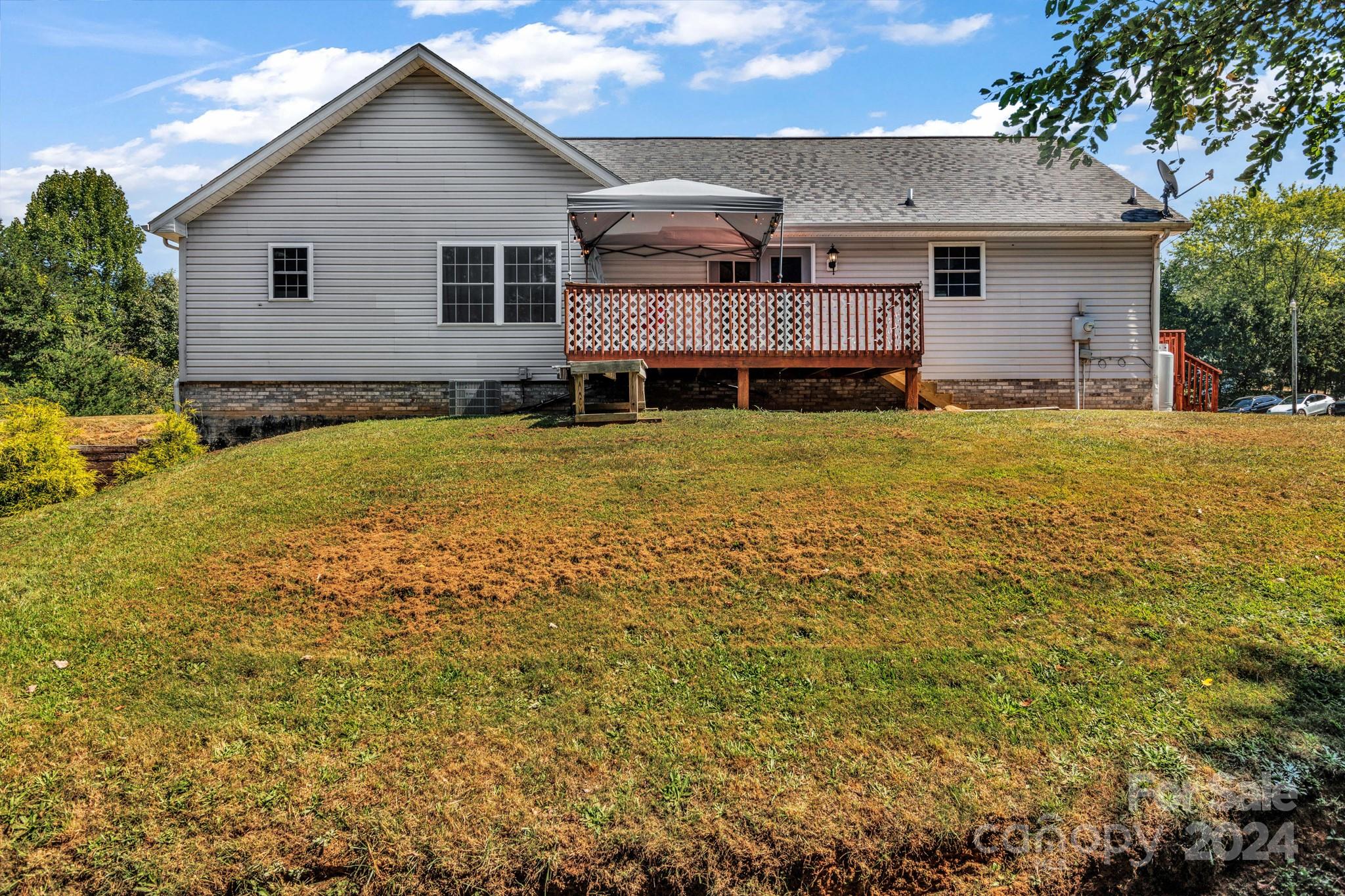 368 Richards Ridge Canton, NC 28716 - Photo 32 of 34 a front view of house with yard and trees in the background