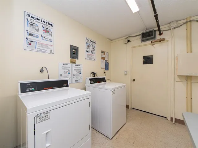 a view of a swimming pool and outdoor seating