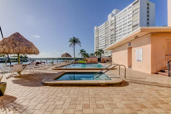 a view of a park with a large trees