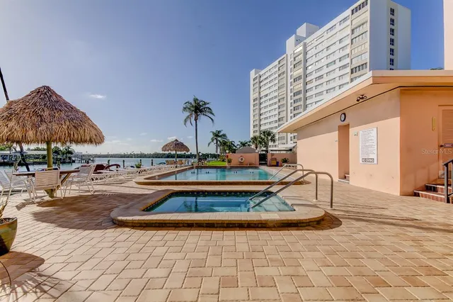 a view of a park with a large trees