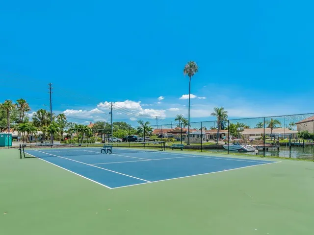 a view of swimming pool with a patio