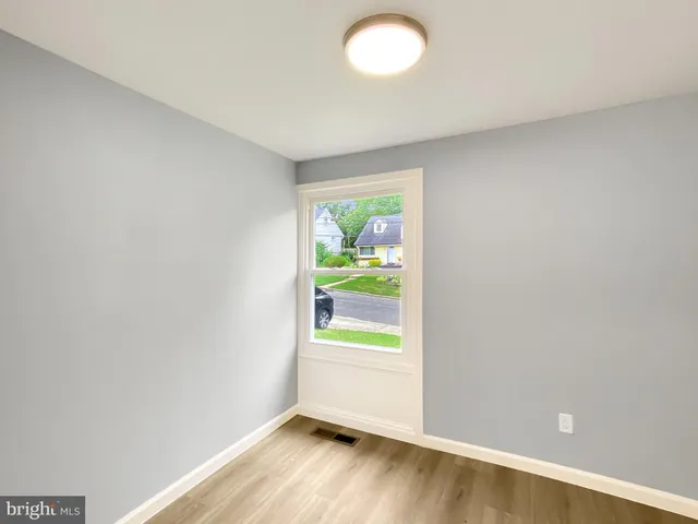 an empty room with window