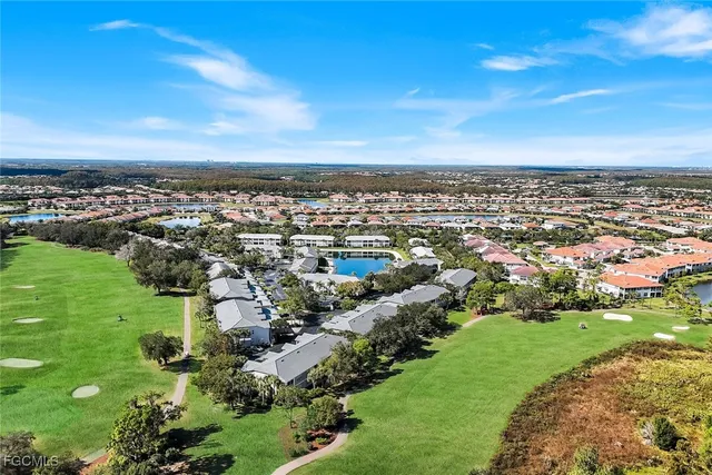 an aerial view of a city with lots of residential buildings