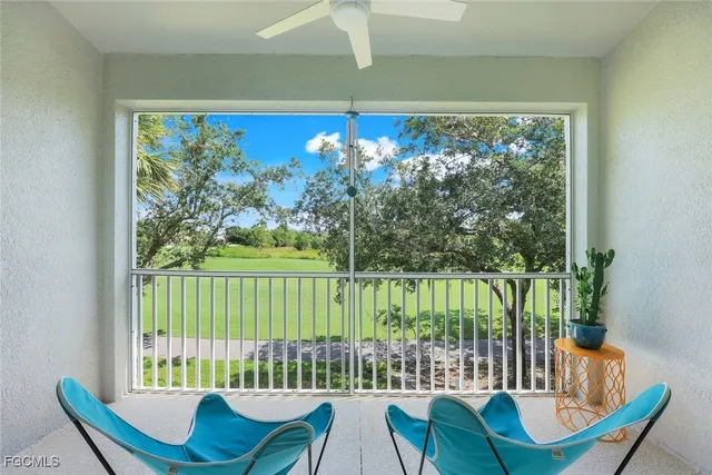 a view of a two chairs in the room