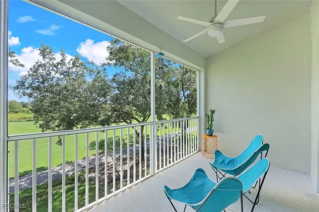 a view of a porch with furniture