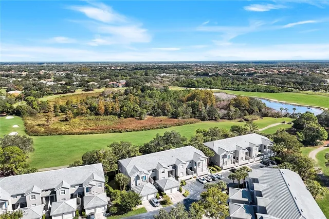 an aerial view of a house with a garden