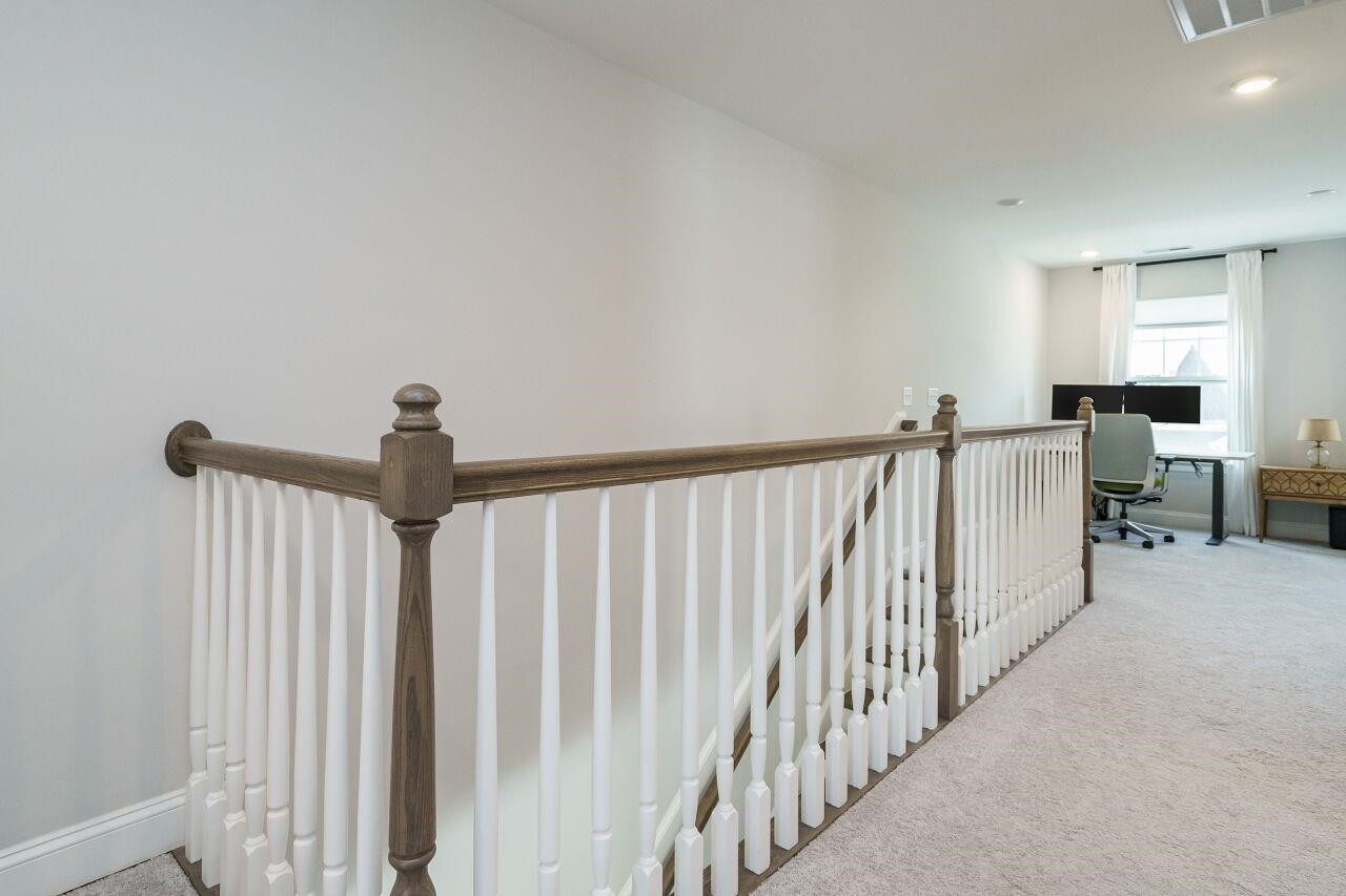 136 Rostova Way Holly Springs, NC 27540 - Photo 20 of 42 Open Rail with Wood Balusters