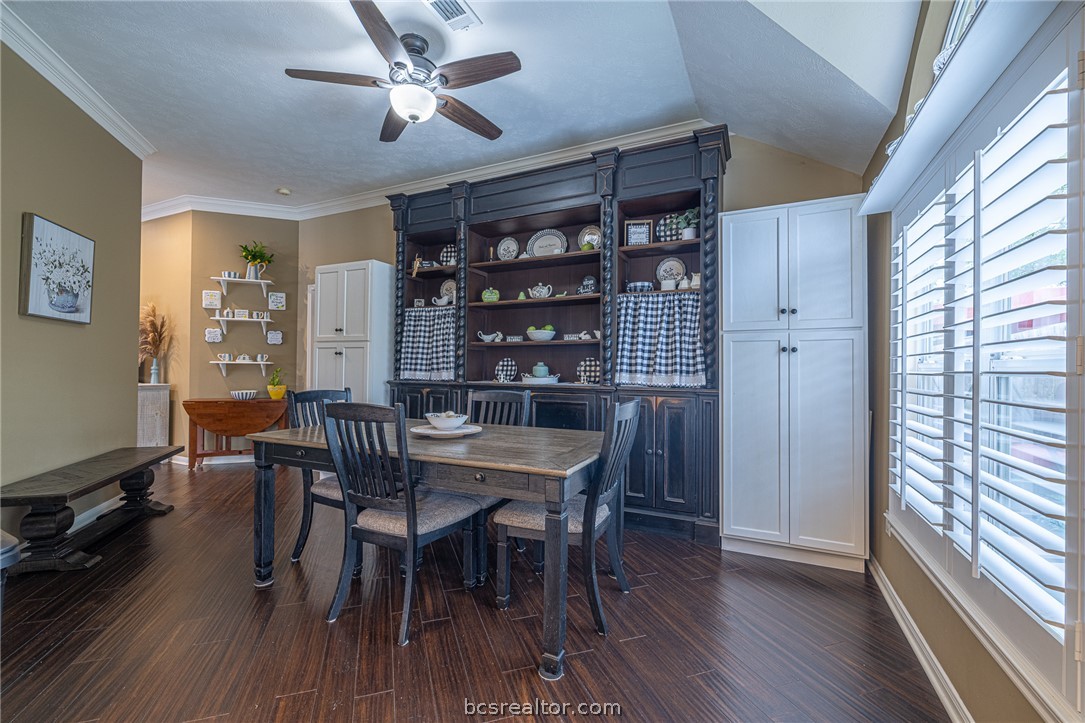 2633 Trophy Drive Bryan, TX 77802 - Photo 17 of 47 a view of a dining room with furniture window and wooden floor