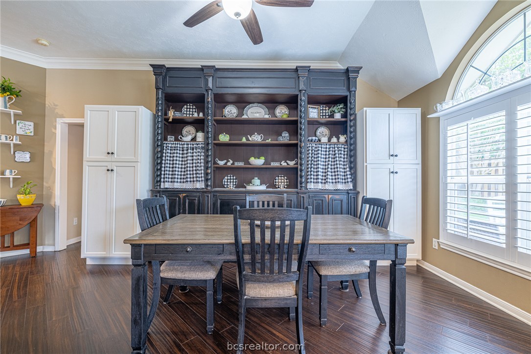 2633 Trophy Drive Bryan, TX 77802 - Photo 18 of 47 a view of a dining room with furniture window and wooden floor