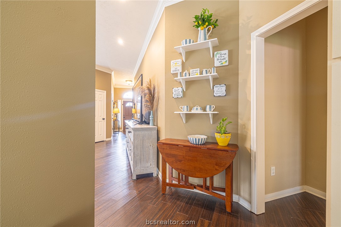 2633 Trophy Drive Bryan, TX 77802 - Photo 21 of 47 a view of a dining room with furniture and wooden floor