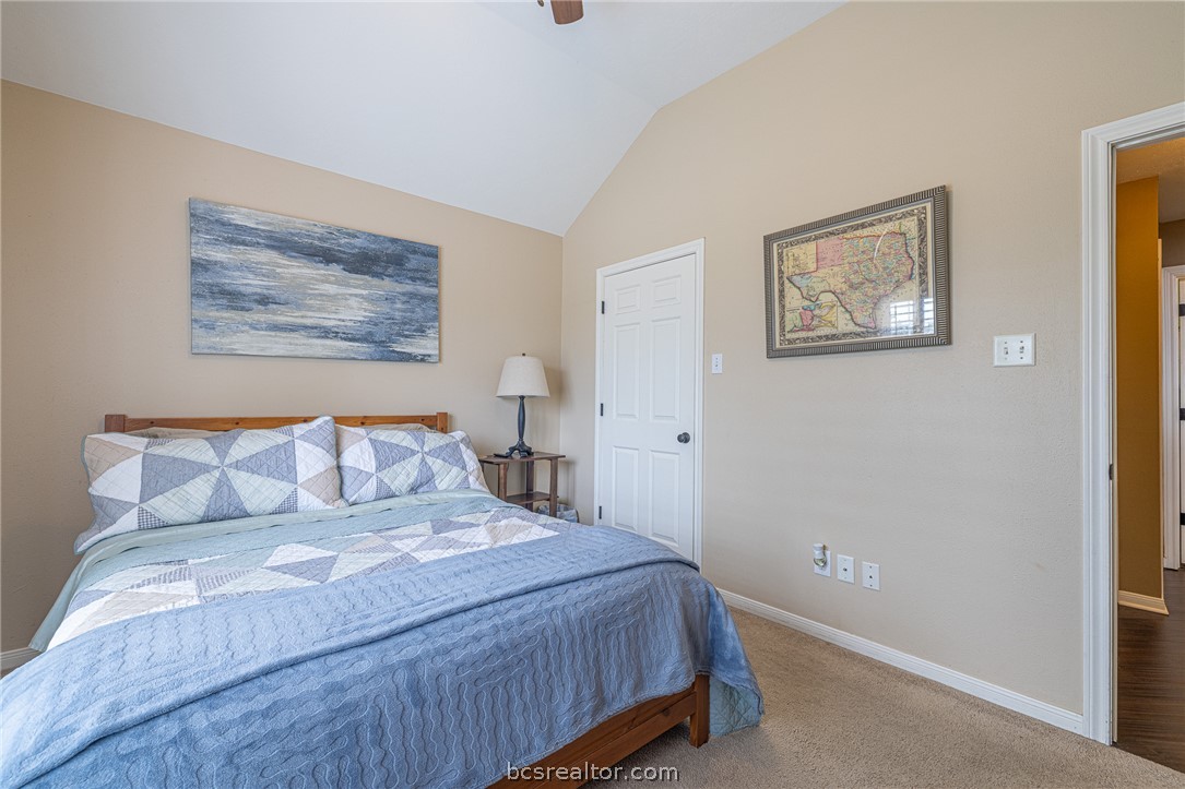 2633 Trophy Drive Bryan, TX 77802 - Photo 23 of 47 a bedroom with a bed and a wall painting