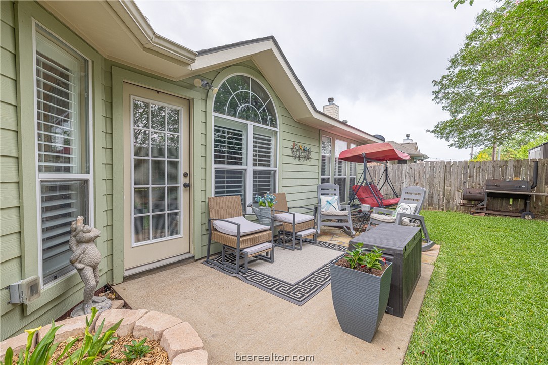 2633 Trophy Drive Bryan, TX 77802 - Photo 39 of 47 a view of a house with backyard and sitting area