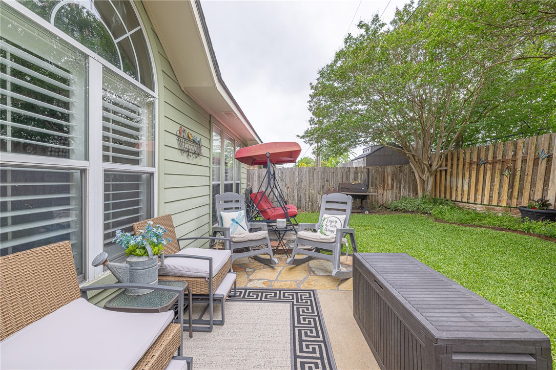 2633 Trophy Drive Bryan, TX 77802 - Photo 47 of 47 a view of a patio with couches table and chairs and potted plants