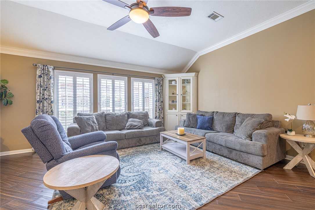 2633 Trophy Drive Bryan, TX 77802 - Photo 7 of 47 a living room with furniture and a large window