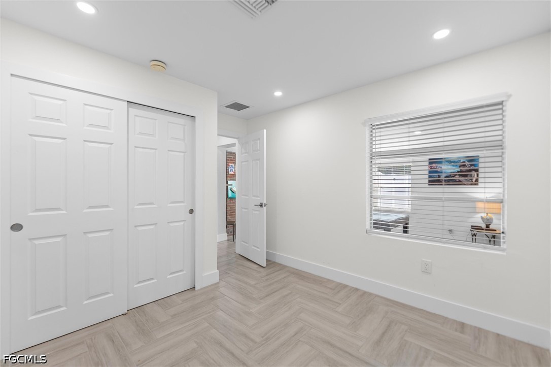1200 Patterson Road Cape Coral, FL 33909 - Photo 20 of 42 a view of an empty room with a window