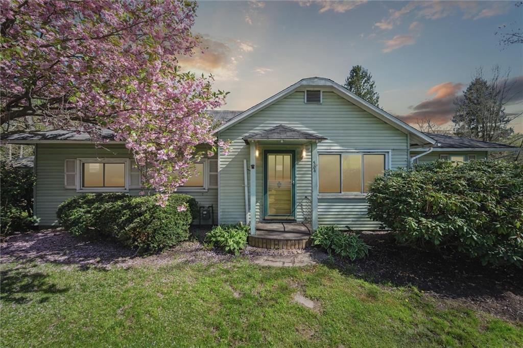 564 Rte 119 Highway North Indiana, PA 15701 - Photo 1 of 25 a front view of a house with garden