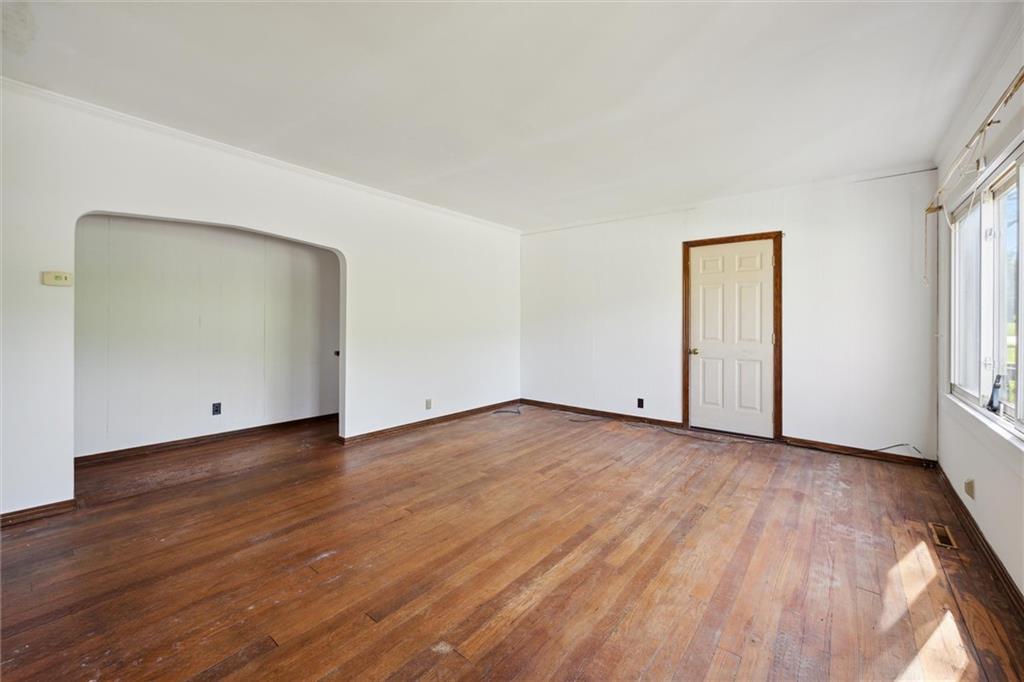 564 Rte 119 Highway North Indiana, PA 15701 - Photo 7 of 25 an empty room with wooden floor and windows