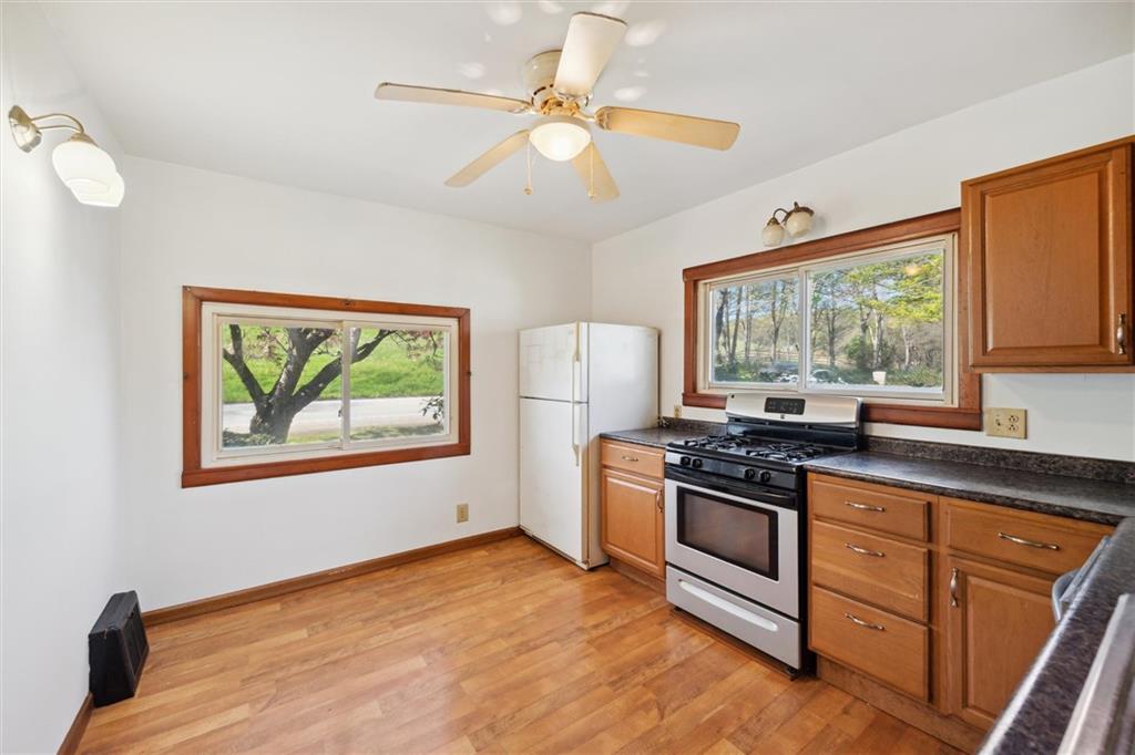 564 Rte 119 Highway North Indiana, PA 15701 - Photo 8 of 25 a kitchen with stainless steel appliances granite countertop a stove and a sink