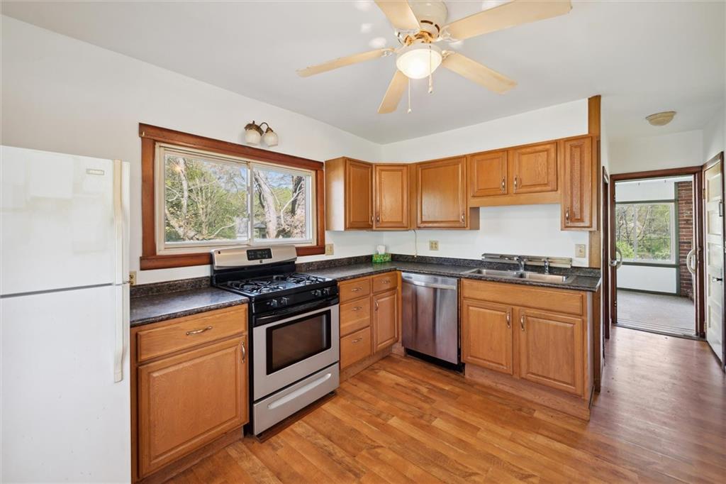 564 Rte 119 Highway North Indiana, PA 15701 - Photo 9 of 25 a kitchen with stainless steel appliances granite countertop a stove and a refrigerator