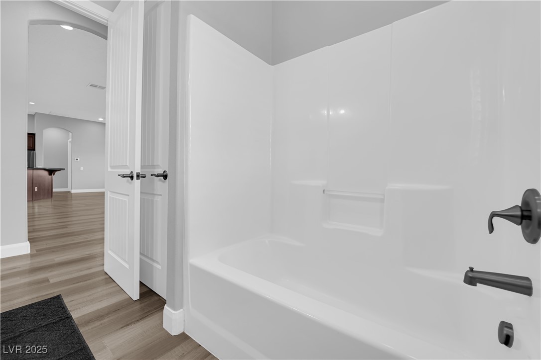 1415 Curohee Street Moapa, NV 89025 - Photo 21 of 54 Full bath with light wood finished floors, bathtub / shower combination, and recessed lighting