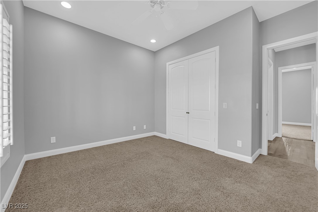 1415 Curohee Street Moapa, NV 89025 - Photo 23 of 54 Unfurnished bedroom featuring carpet, recessed lighting, a closet, and ceiling fan