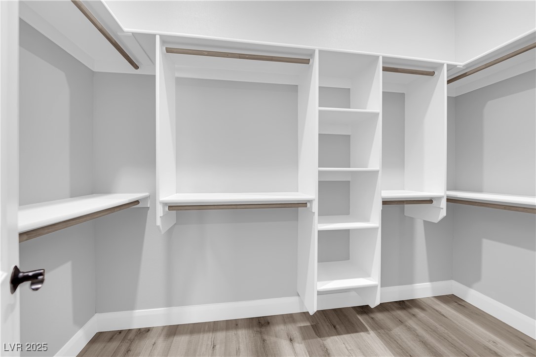 1415 Curohee Street Moapa, NV 89025 - Photo 28 of 54 Walk in closet with light wood-type flooring