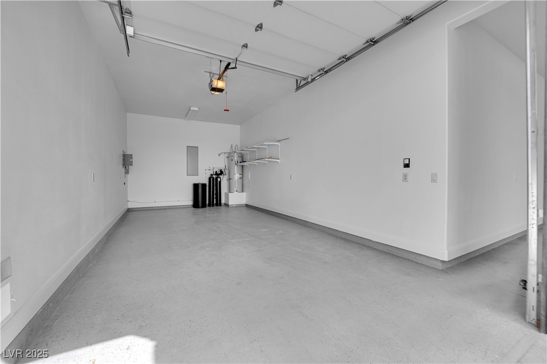 1415 Curohee Street Moapa, NV 89025 - Photo 34 of 54 Garage with secured water heater and baseboards