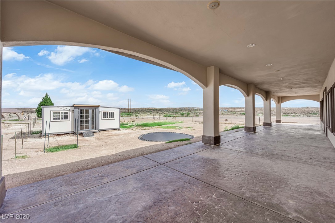 1415 Curohee Street Moapa, NV 89025 - Photo 36 of 54 View of patio featuring an outbuilding