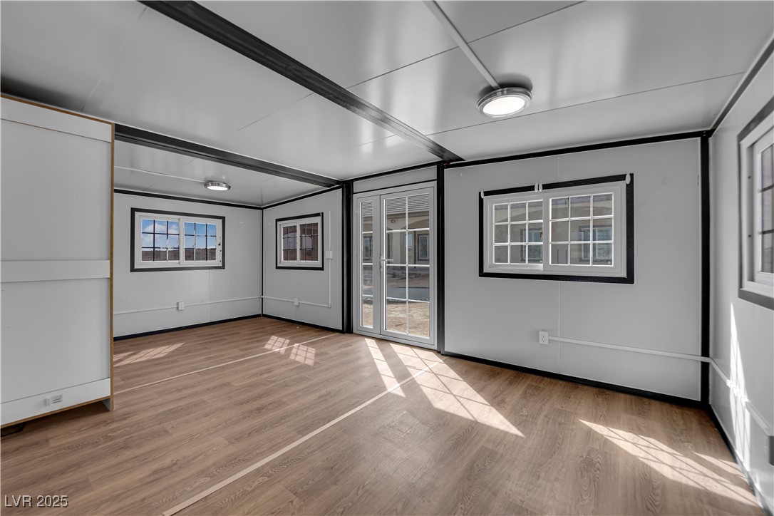 1415 Curohee Street Moapa, NV 89025 - Photo 50 of 54 Empty room with light wood-style flooring