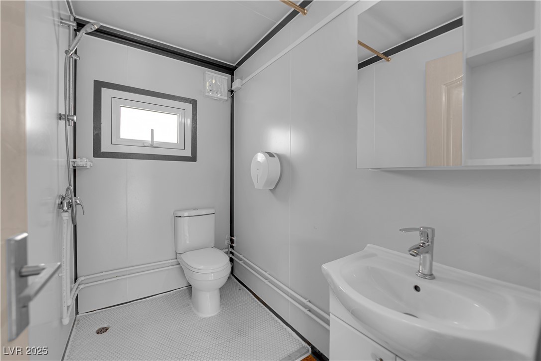 1415 Curohee Street Moapa, NV 89025 - Photo 51 of 54 Bathroom featuring vanity and tile patterned floors