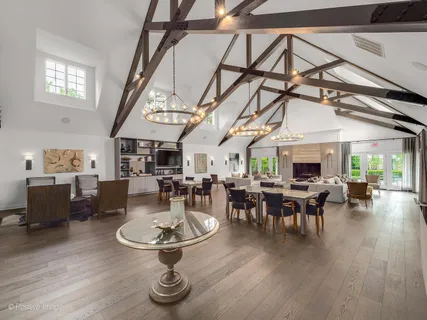 a living room with furniture and fireplace