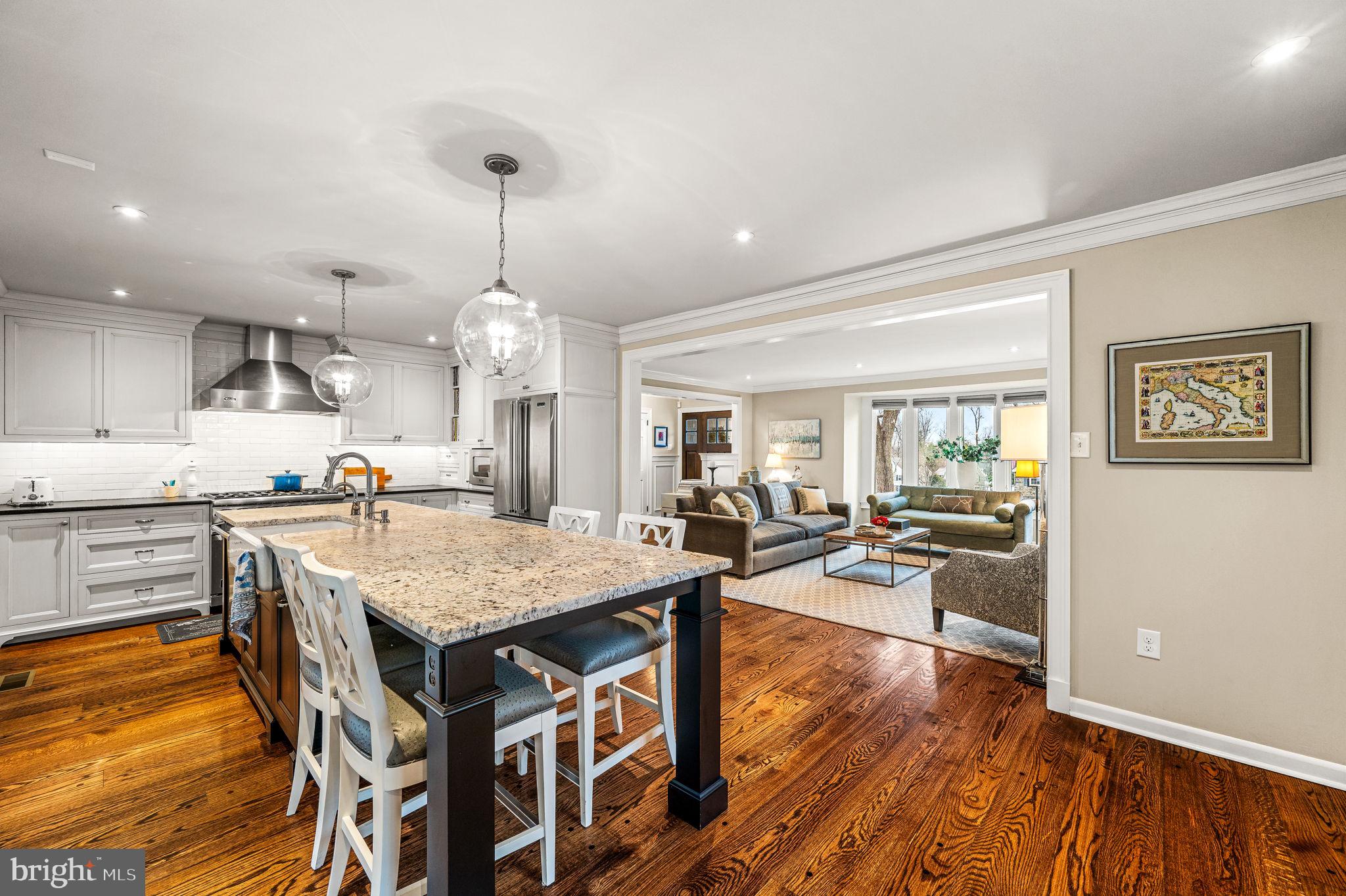 43 Crestline Road Wayne, PA 19087 - Photo 13 of 48 a large kitchen with a table and chairs