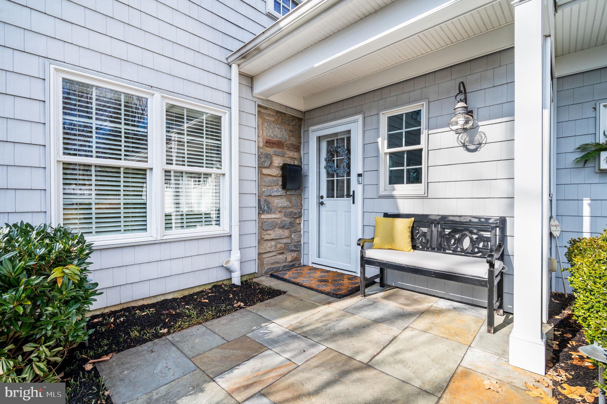 43 Crestline Road Wayne, PA 19087 - Photo 6 of 48 a view of a patio with couches chairs and potted plants