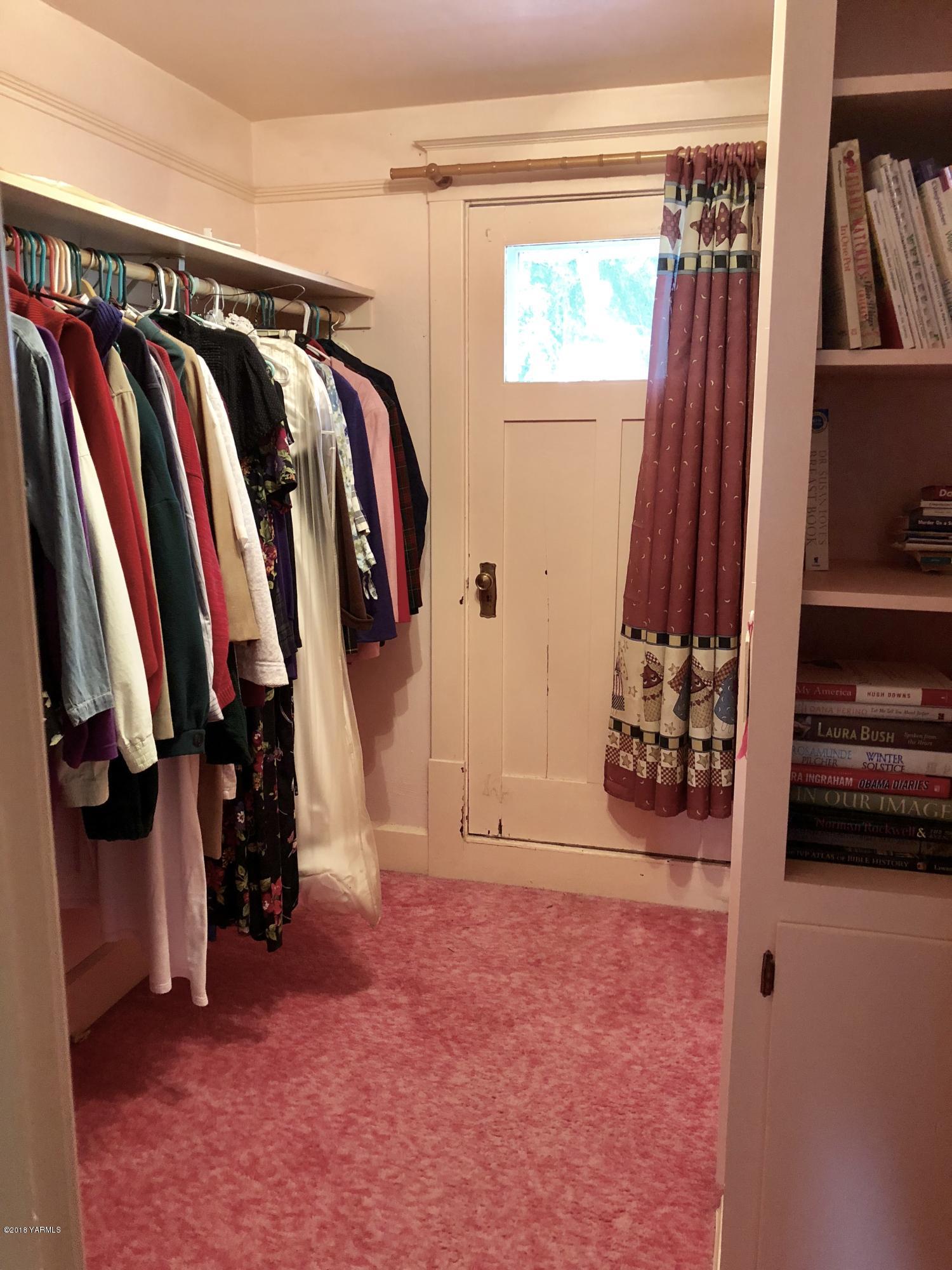 16573 Branch Road Harrah, WA 98933 - Photo 15 of 33 a view of walk in closet with clothes and shoes