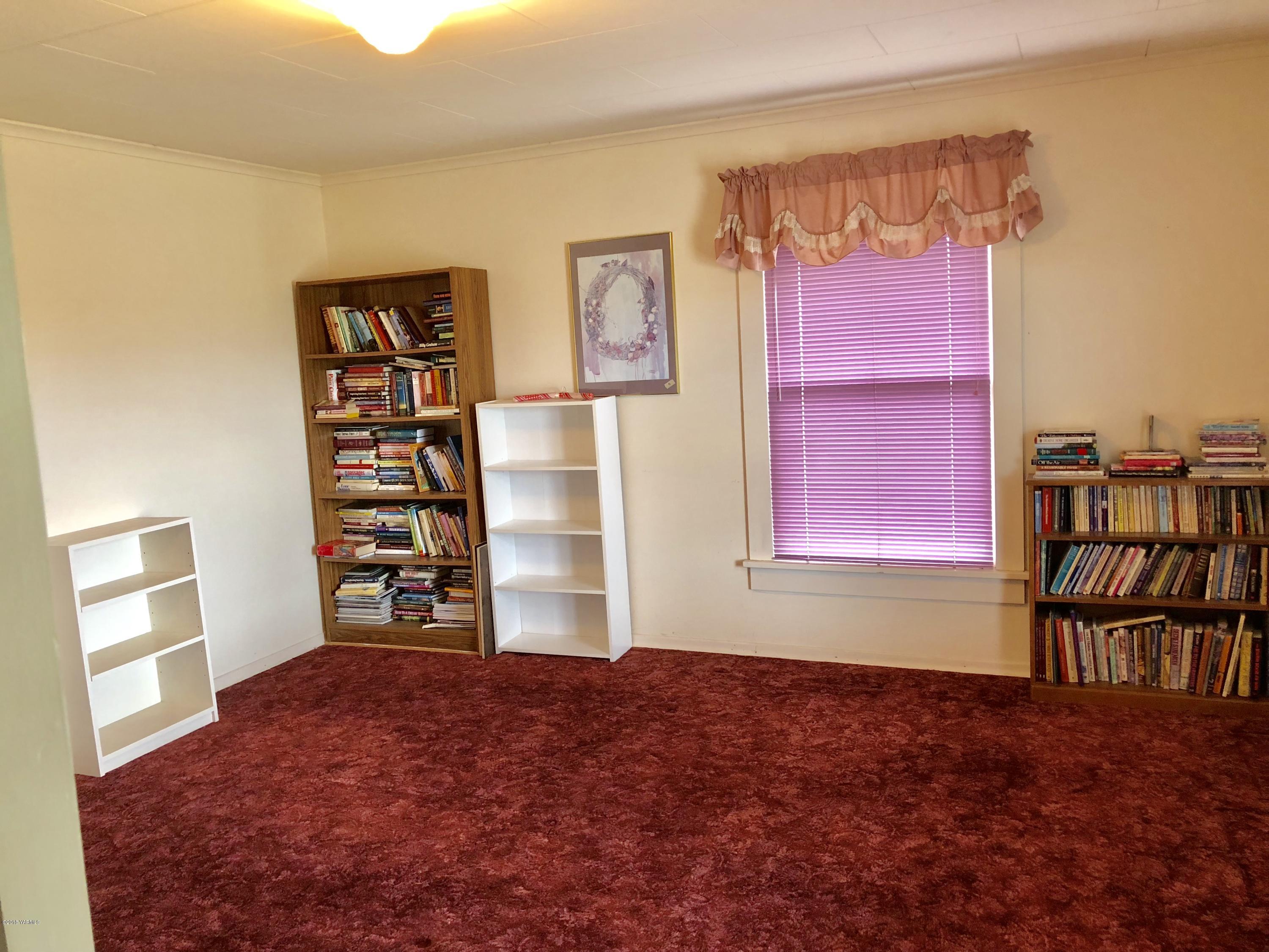 16573 Branch Road Harrah, WA 98933 - Photo 18 of 33 a view of a bedroom with furniture and window