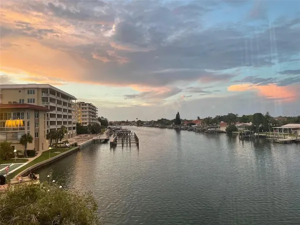 a view of a lake with a city