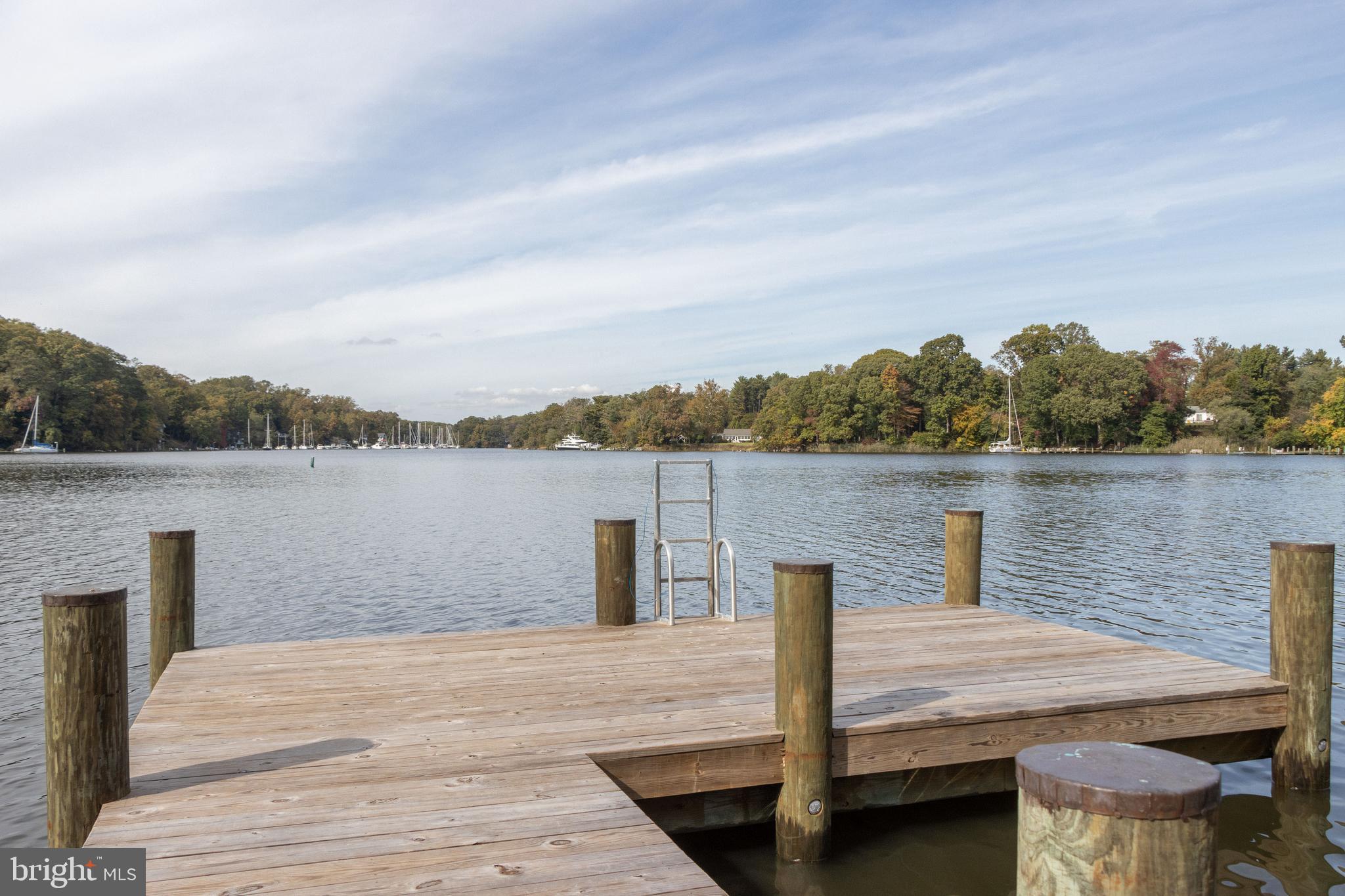 1832 Milvale Road Annapolis, MD 21409 - Photo 11 of 129 Huge deck with ladder at the end of pier