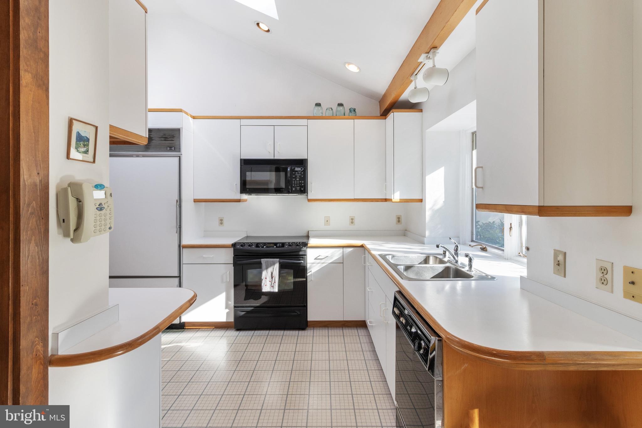 1832 Milvale Road Annapolis, MD 21409 - Photo 41 of 129 Light filled kitchen with access to basement