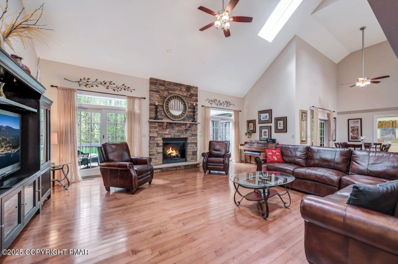 1179 Manor Hill Road Pocono Pines, PA 18350 - Photo 2 of 28 a living room with fireplace furniture and a flat screen tv