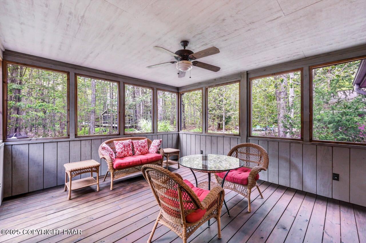 1179 Manor Hill Road Pocono Pines, PA 18350 - Photo 25 of 28 a living room with furniture and a large window