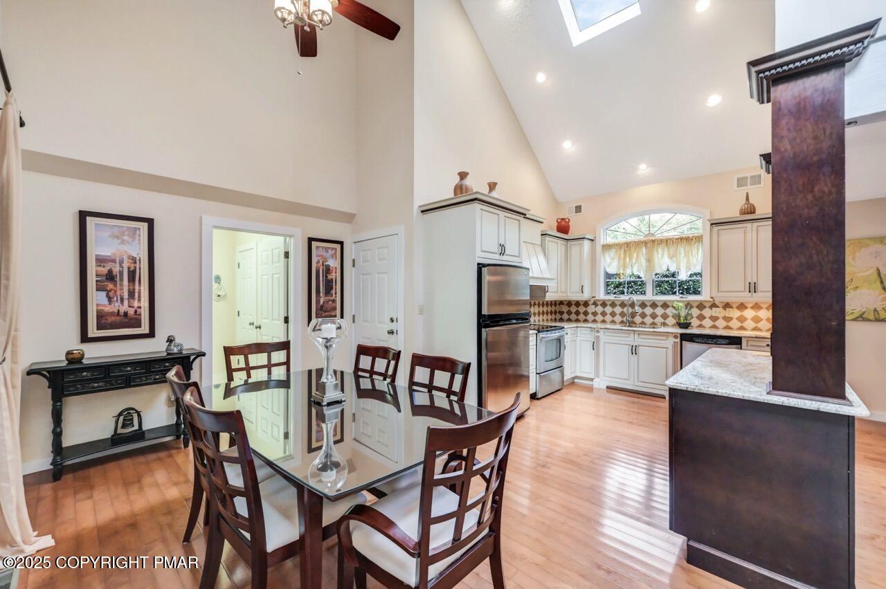 1179 Manor Hill Road Pocono Pines, PA 18350 - Photo 7 of 28 a view of a dining room kitchen and a window